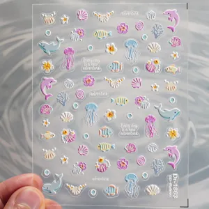 5D embossed ocean nail stickers featuring cute dolphins, jellyfish, shells and fish details.