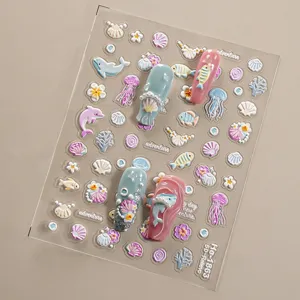 5D embossed ocean nail stickers featuring cute jellyfish dolphins and shells for stunning manicures.