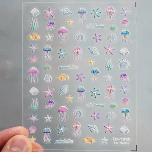5D embossed marine nail stickers featuring cute jellyfish, starfish, and shells for nail art.