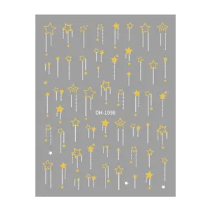 Detailed shot of 3D gold foil shooting star nail stickers, sparkling star patterns for phone decors.