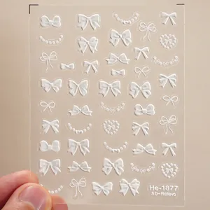 5D embossed white bow nail stickers pearl sweet style DIY manicure decal sheet detail view.