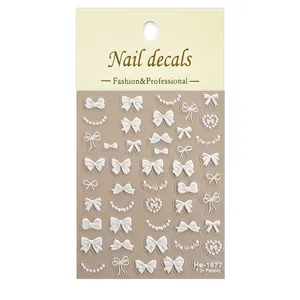 5D relief bow nail stickers, pearl heart nail art decals, DIY manicure accessories detail view