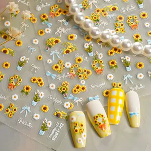 5D embossed sunflower nail stickers detail view with cute daisy and bow designs for manicure art.