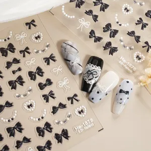 5D embossed bow nail stickers, black and white pearl nail art decals for manicure design.