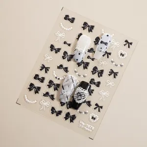5D embossed nail art stickers with black and white bow and pearl design for detail view