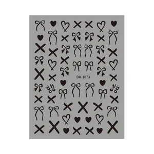 3D nail art stickers sheet featuring cute bows hearts and cross patterns for DIY manicure.