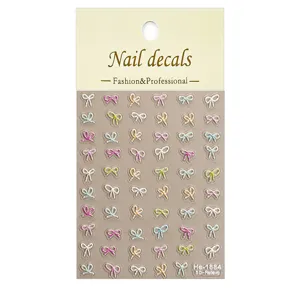 Detailed view of 5D embossed colorful bow nail art stickers, delicate DIY manicure design.
