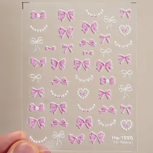 5D embossed bow pearl nail stickers, cute pink and white stereo nail art decals for women.