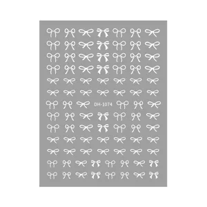 Detailed view of white bow nail stickers featuring neat rows of cute designs for DIY nail art.