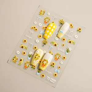 5D embossed sunflower nail sticker detail showing intricate floral and bow patterns clearly.