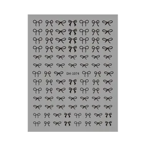 Black bow nail art stickers sheet, minimalist design, easy to apply for DIY manicure.
