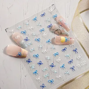 5D embossed nail art stickers cute blue silver bow design self adhesive manicure decal sheet.