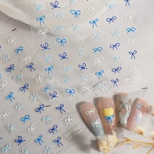 5D embossed blue white bow nail stickers cute adhesive nail art decals for DIY manicure design.