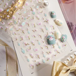 Detail shot of 5D embossed magnolia flower nail stickers with elegant vase patterns and tips.
