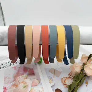 Detailed view of wide matte hair bands, solid color non-slip headbands for women daily wear.