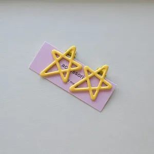 Cute yellow star hair clips detail shot, sweet candy color side bangs duckbill clip for kids.
