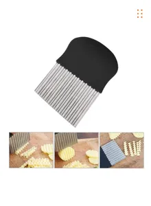 Stainless steel potato crinkle cutter kitchen tool for making wavy french fries easily.