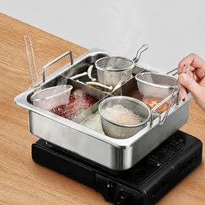 Hot pot multi-scomparto in acciaio inossidabile con comodi cestelli filtranti a sospensione.