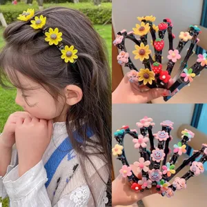 Kids multi-layer headband detail view showcasing cute floral and strawberry charms design.
