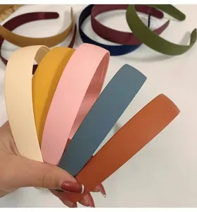 Minimalist wide matte headband for women, fashionable solid color hair hoop for daily wear.