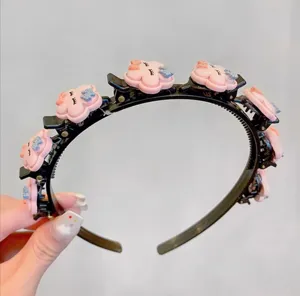 Children sweet multi-clip plastic hair band with cute pink cloud charms for girls daily use.