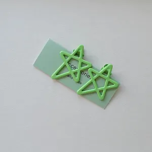 Green candy color hollow star hair clips sweet duckbill clips for cute girls bangs and daily style.