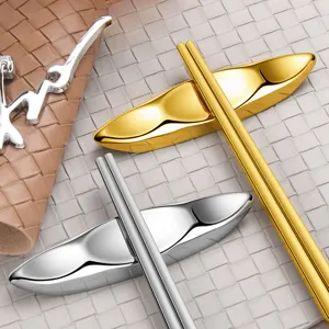 Stainless steel chopstick rest set creative gold silver table holder for home and hotel dining decor.