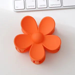 Orange matte flower hair claw clip, cute candy color shark clip for women and girls daily styling.