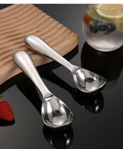 Stainless steel ice cream scoop set, durable kitchen tool for fruit and dessert serving detail view.