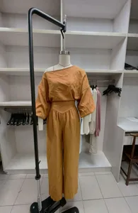 Stylish women off shoulder top and wide leg pants two piece set casual chic outfit.