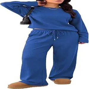 Detail view of the cozy blue long-sleeve crewneck top and wide-leg lounge pants set.