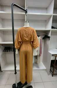 Women solid off-shoulder top and wide leg pants jumpsuit detail view back display