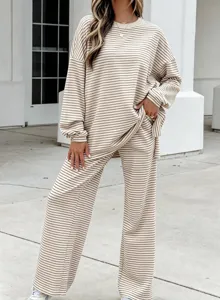 Detailed view of casual striped knit lounge set with long sleeve top and comfortable pants.