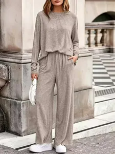 Detailed view of the cozy knit two-piece set in neutral khaki, perfect for casual wear.