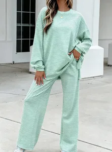 Mint green striped long sleeve knit top and wide leg lounge pants set detail shot.