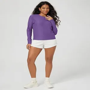 Purple long sleeve athletic top detail, slim fit crewneck casual apparel for women.