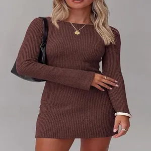 Ribbed knit texture detail of the brown long-sleeve bodycon dress worn by model.