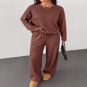 Detailed view of women casual brown knitwear loungewear set long sleeve top and wide leg pants.