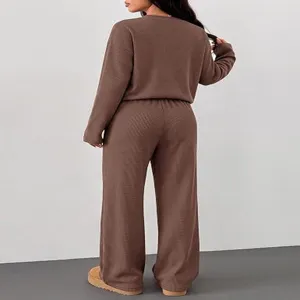 Brown ribbed two-piece casual lounge set detail, long sleeve top and wide leg pants.