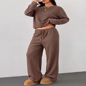 Women waffle knit loungewear set, long sleeve crewneck top and wide leg pants, brown.