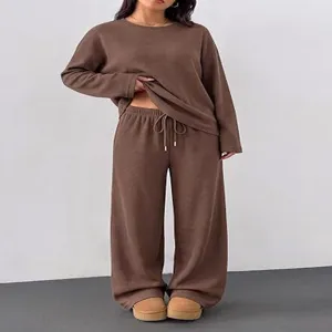 Brown women long sleeve crewneck top and wide leg pants casual set detail view.
