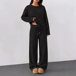 Women's casual lounge set featuring a long sleeve crewneck top and matching wide leg pants.