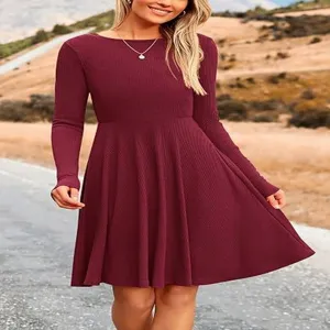 Elegant wine red long sleeve ribbed skater dress detail, soft knit fabric texture, casual look.