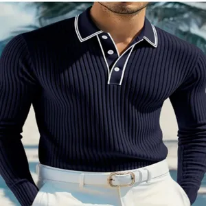 Detailed view of the men's navy blue ribbed long-sleeve polo shirt with white contrast trim.