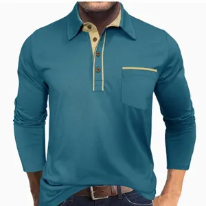 Detailed view of men's long sleeve contrast color lapel polo shirt with pocket and buttons.