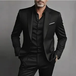 Close-up detail of the premium black suit jacket and trousers set, elegant tailoring.
