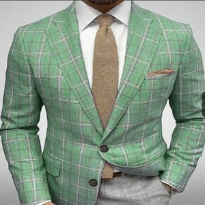 Green plaid suit jacket detail, close-up view of men's casual slim blazer fabric texture.