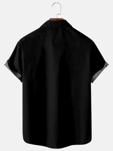 Men's casual short sleeve solid black shirt, comfortable summer vacation beach wear detail.