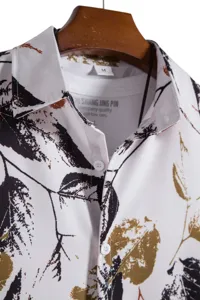 Men's casual leaf print shirt close up detail showing soft cotton fabric and stylish collar.
