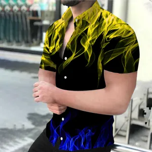 Close up view of men's short sleeve casual shirt featuring striking yellow and blue 3D flames.